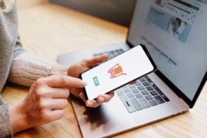 Woman,With,Phone making an Online,Payment